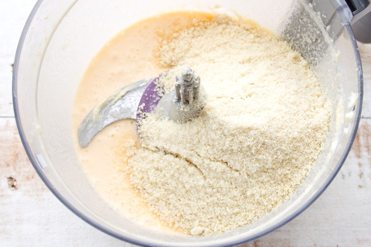 Wet ingredients and almond flour in a bowl.