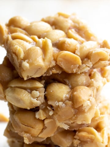 a stack of peanut brittle squares