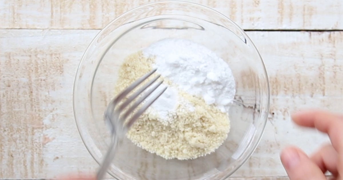 Mixing the dry ingredients with a fork.