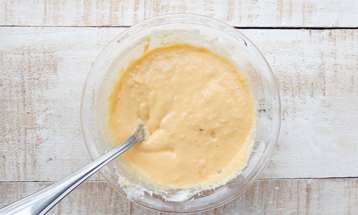 Cake batter in a bowl and a fork.