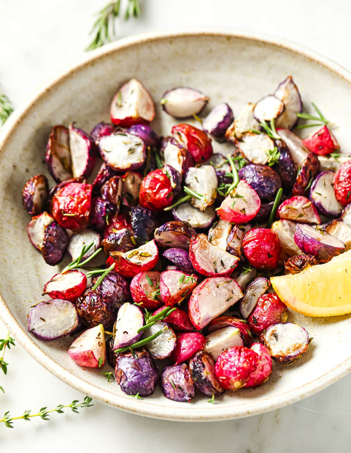 Roasted radishes in a bowl.