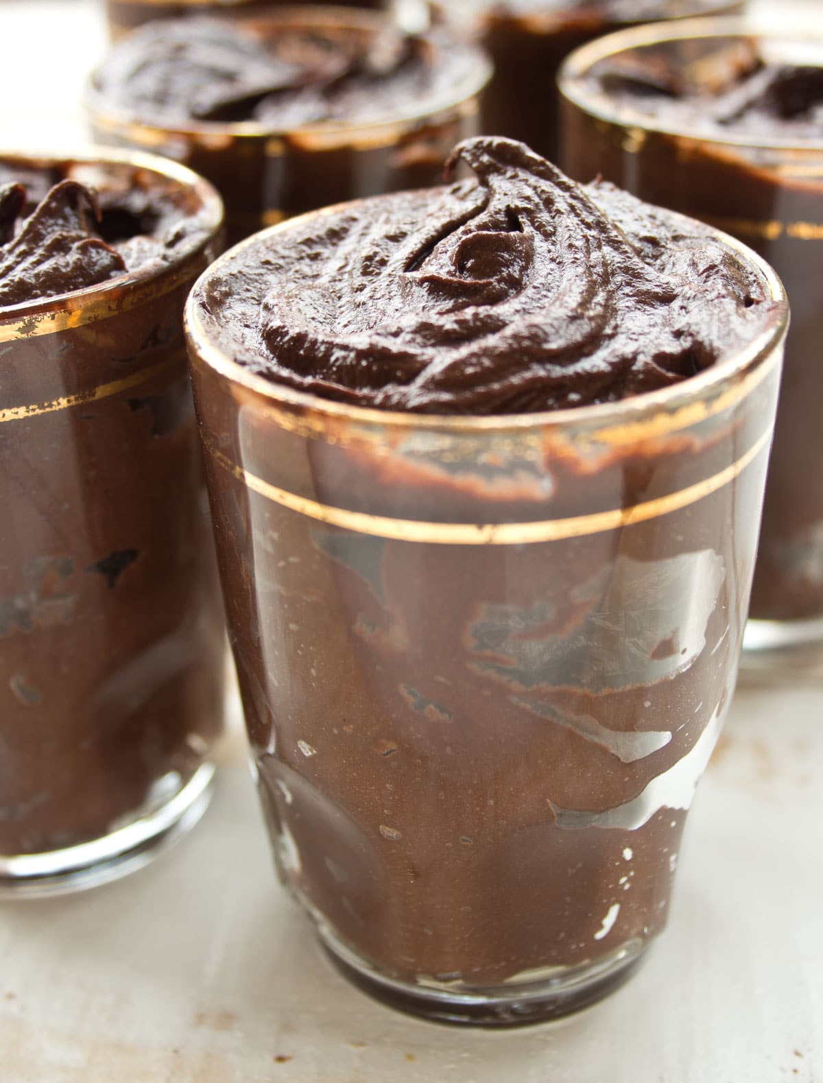 Chocolate pudding in dessert glasses.