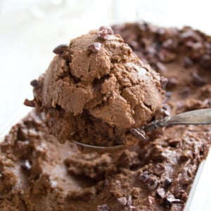 A scoop of avocado chocolate ice cream.
