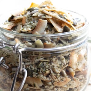 A glass jar with keto muesli.