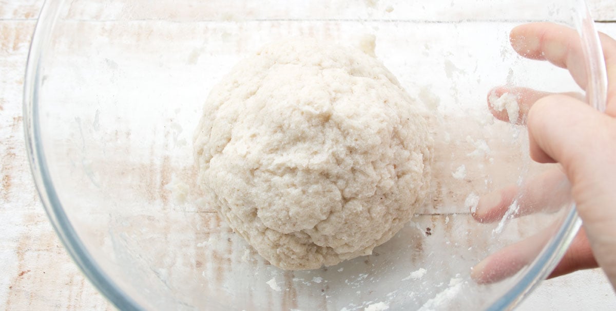 A dough ball in a bowl.