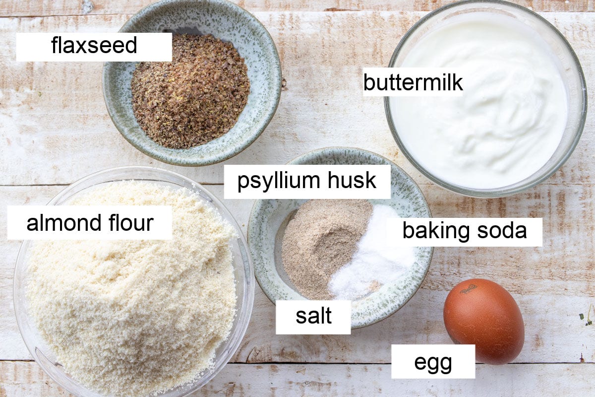 Ingredients to make keto soda bread, measured into bowls and labelled.