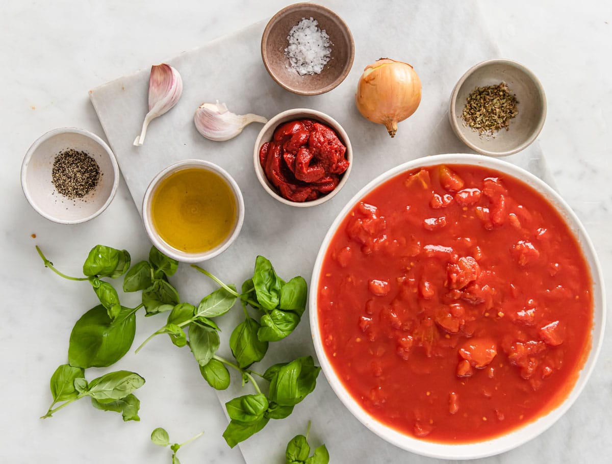 Ingredients to make pizza sauce, measured.