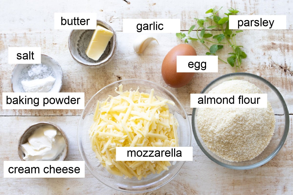 Ingredients to make this garlic bread recipe, measured into bowls and labelled.