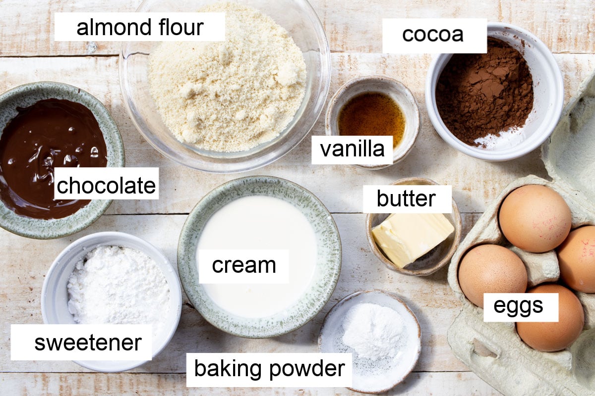 Ingredients to make keto chocolate donuts, measured into bowls and labelled.
