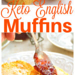 Keto English muffins toasted, buttered and spread with strawberry jam.