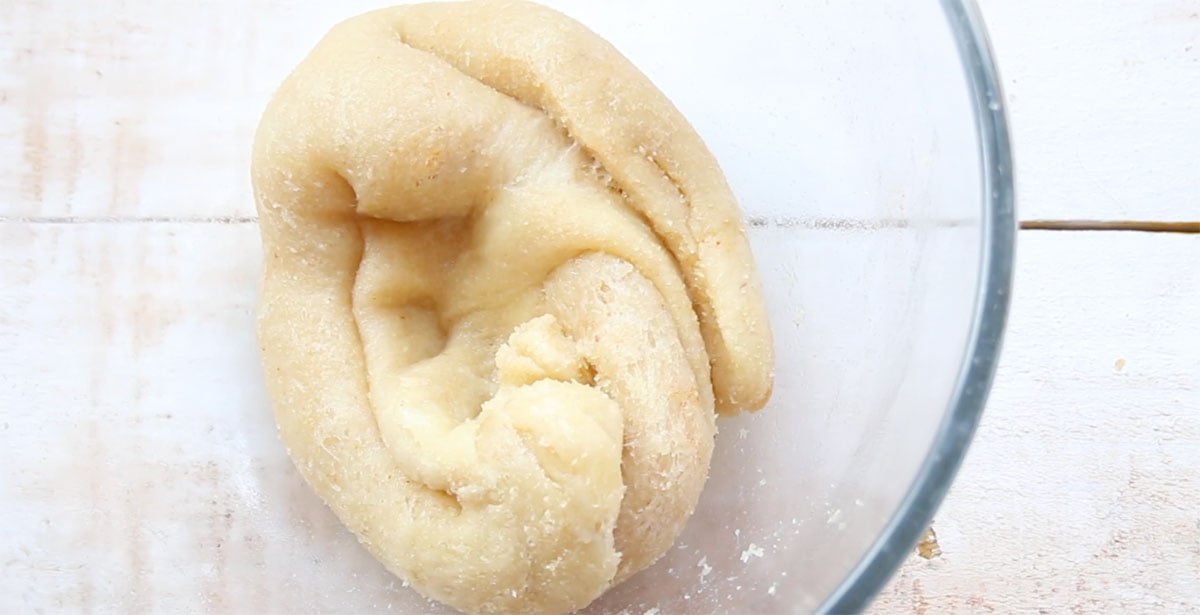 A dough ball in a bowl.