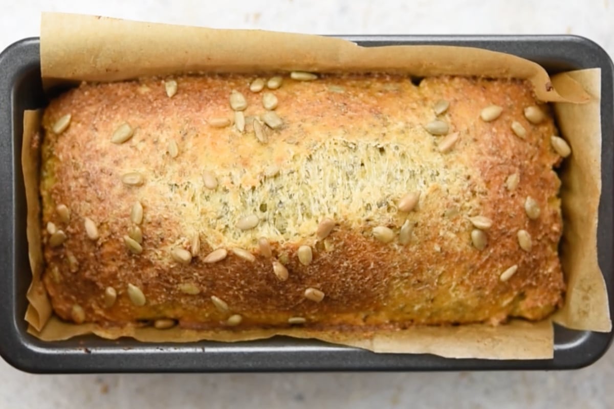 The baked bread in a loaf pan.