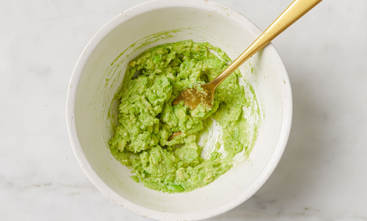 Mashed avocado in a bowl.
