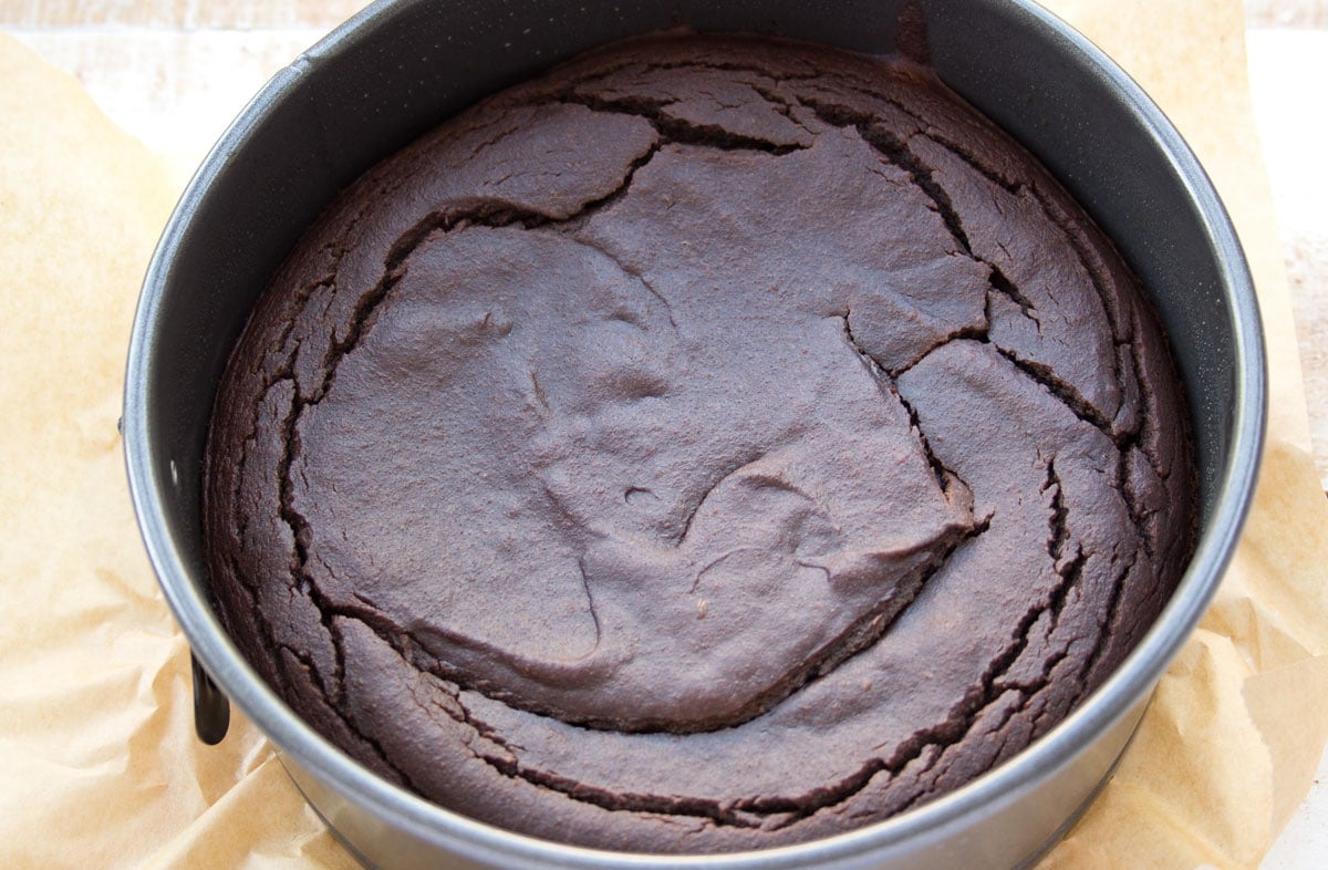 The baked cake inside the springform.