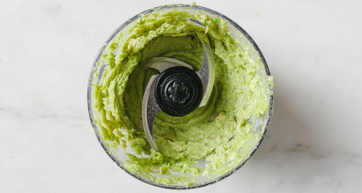 Blended avocado in a food processor.