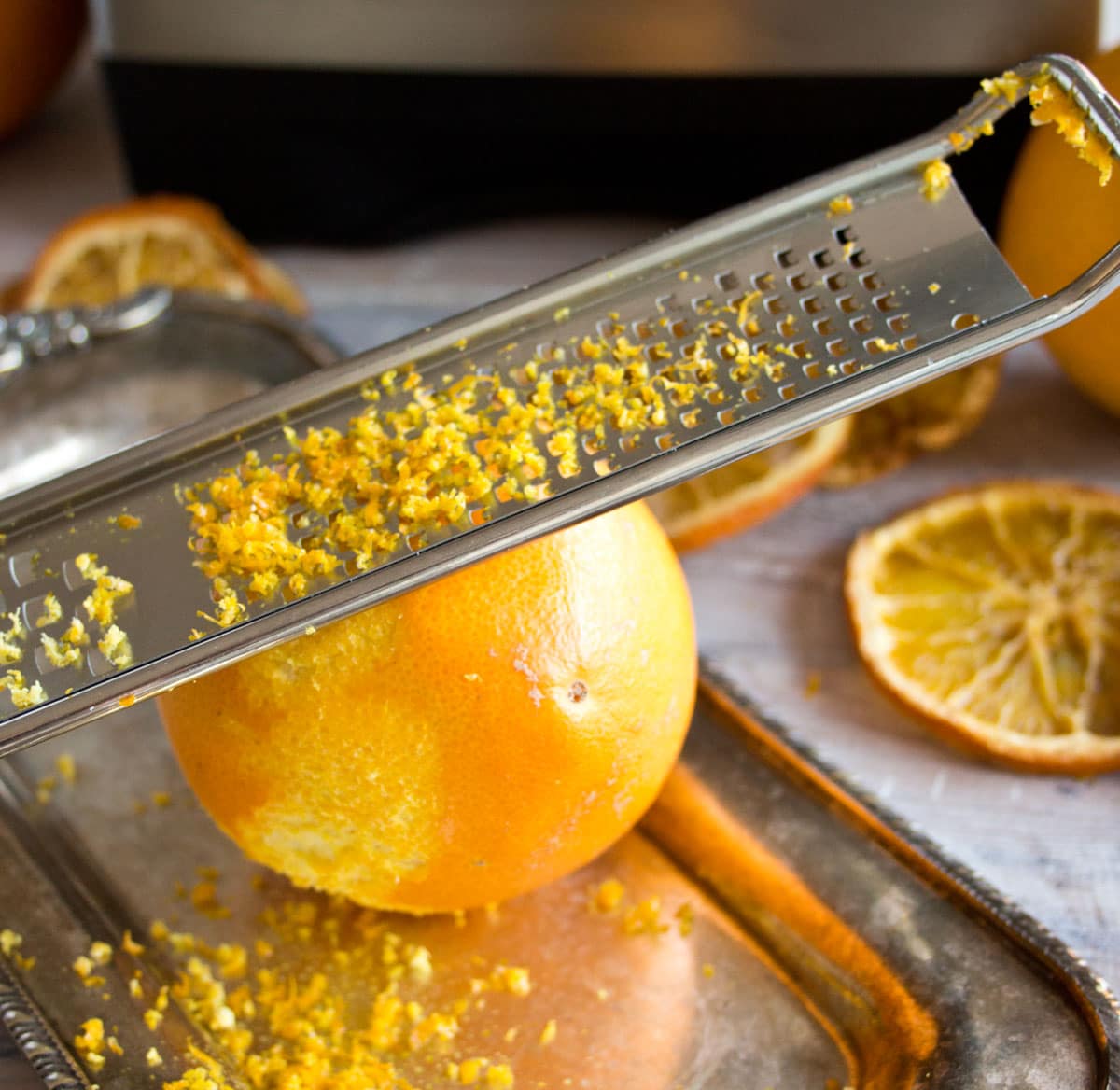 Grating the zest of an orange.