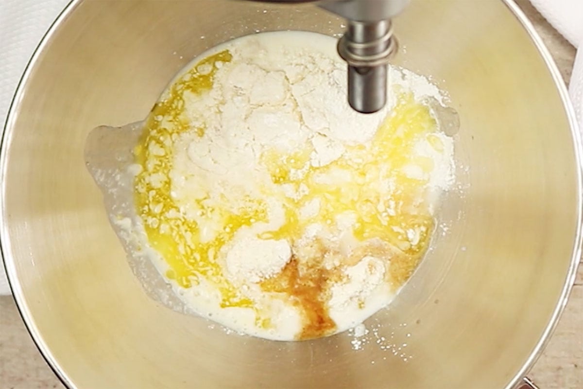 Butter, coconut flour and other ingredients in a mixing bowl.