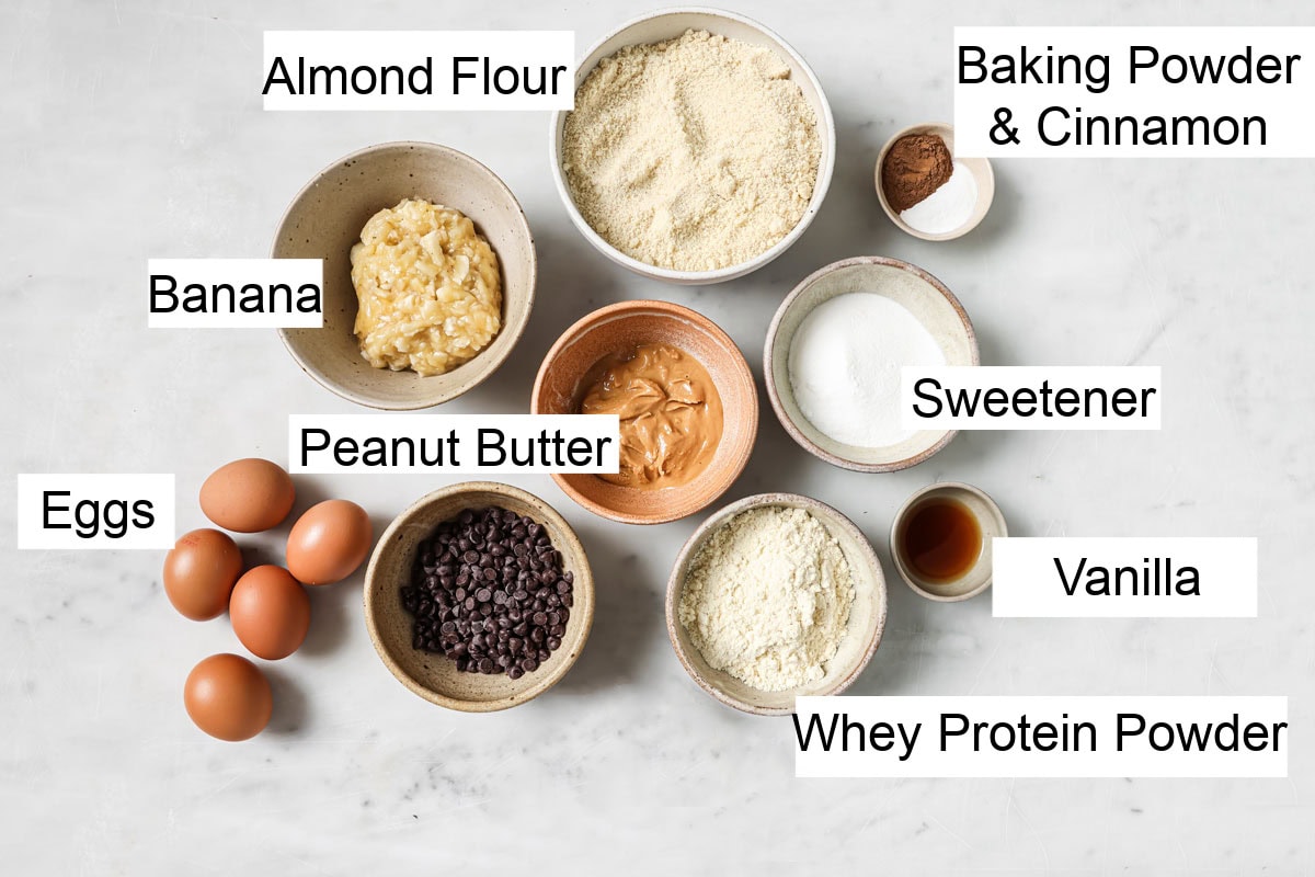 Ingredients for protein banana bread, measured into bowls and labelled.