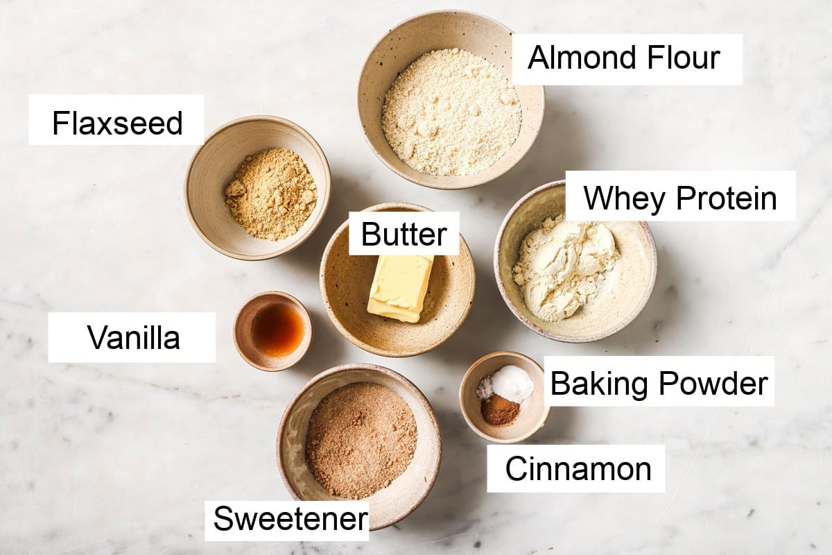 Ingredients to make keto graham crackers, measured into bowls and labelled.