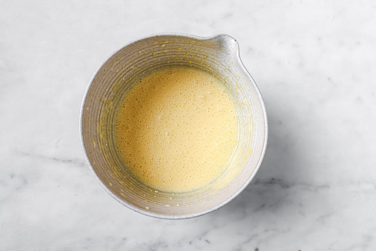 All wet ingredients mixed in a large mixing bowl.