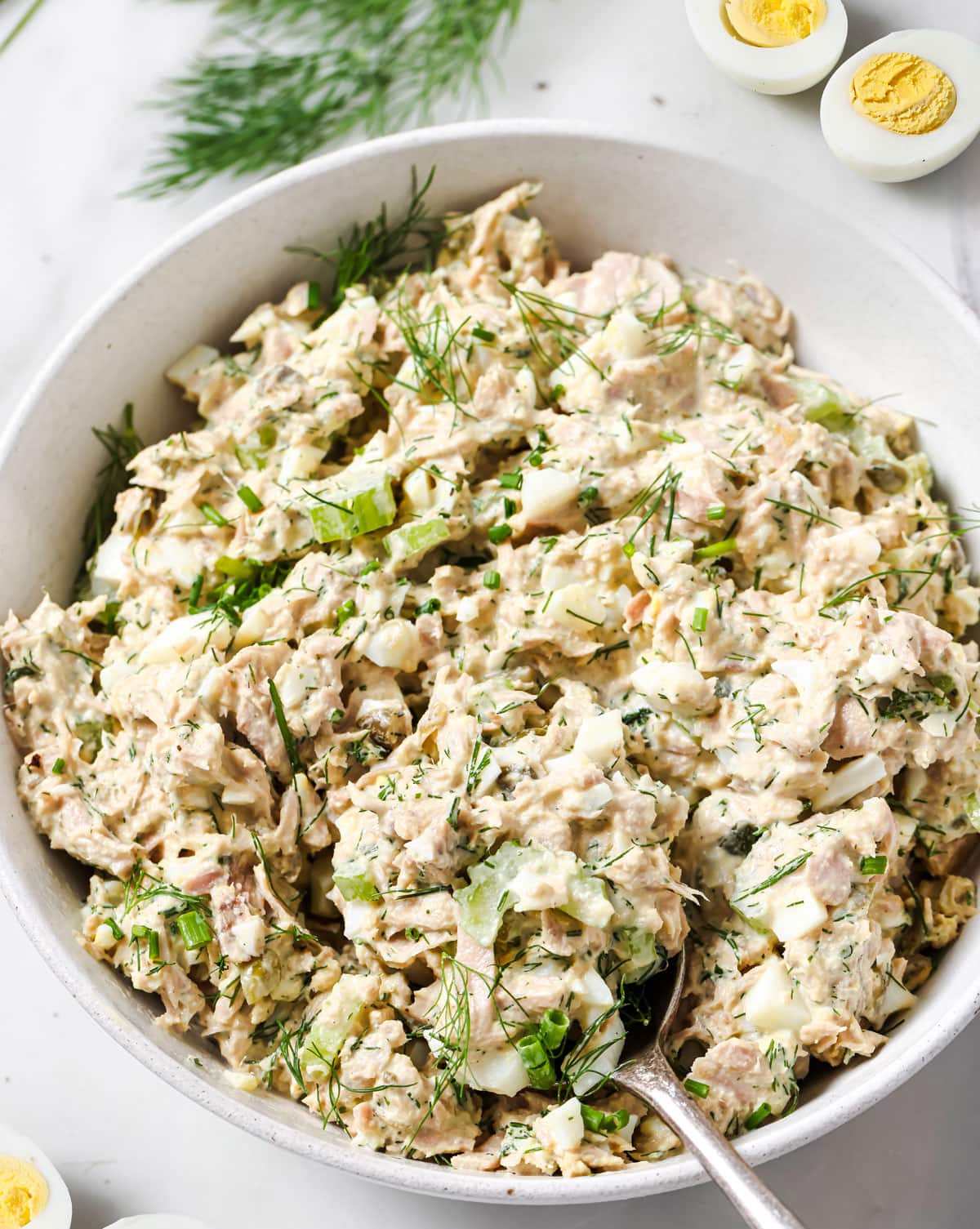 A bowl with tuna egg salad.