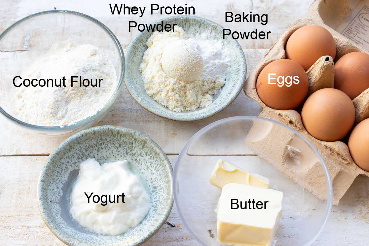 Ingredients to make coconut flour bread, measured and labelled.