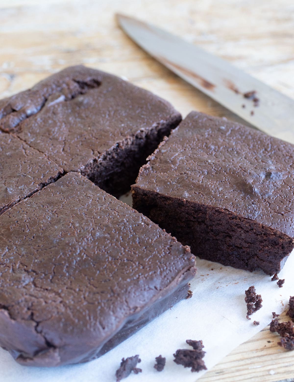 Sliced brownies and a knife.