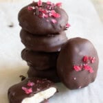 Keto peppermint patties stacked.