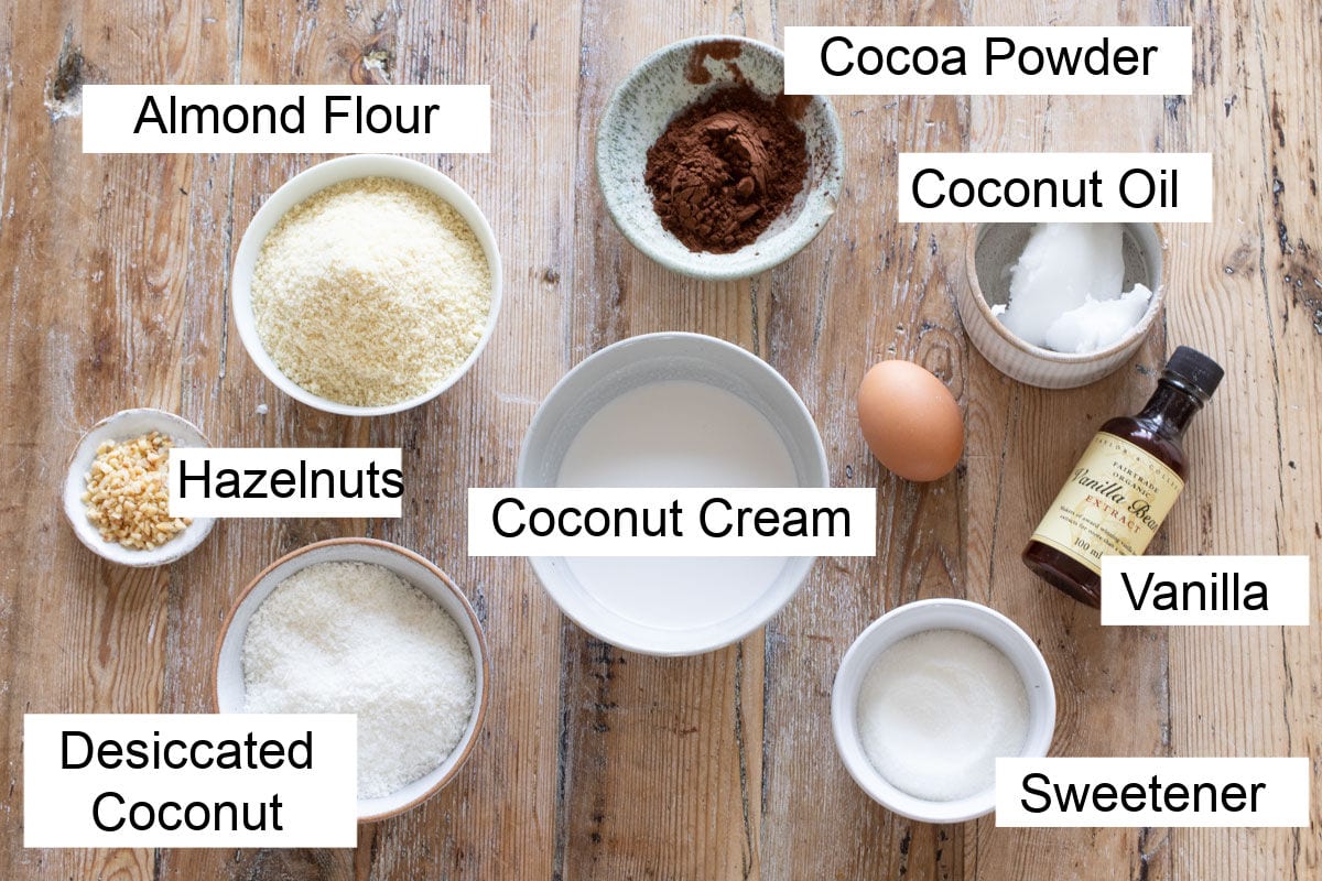 Ingredients to make a keto chocolate tart, measured into bowls and labelled.