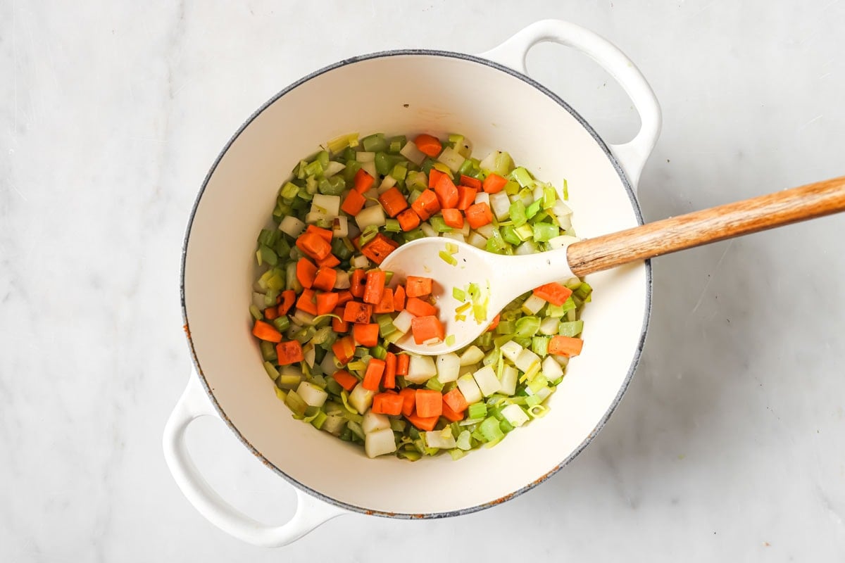 Roasting chopped egetables in a pot.