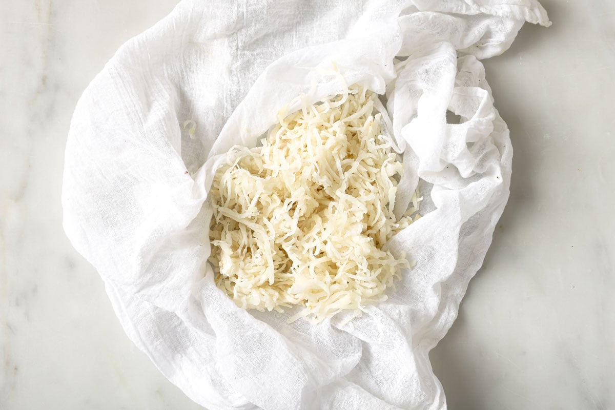 Shredded turnip in a muslin cloth.