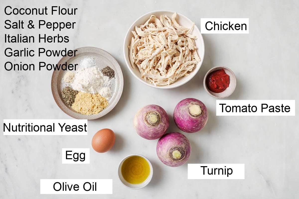 Ingredients to make chicken fritters, measured into bowls and labelled.