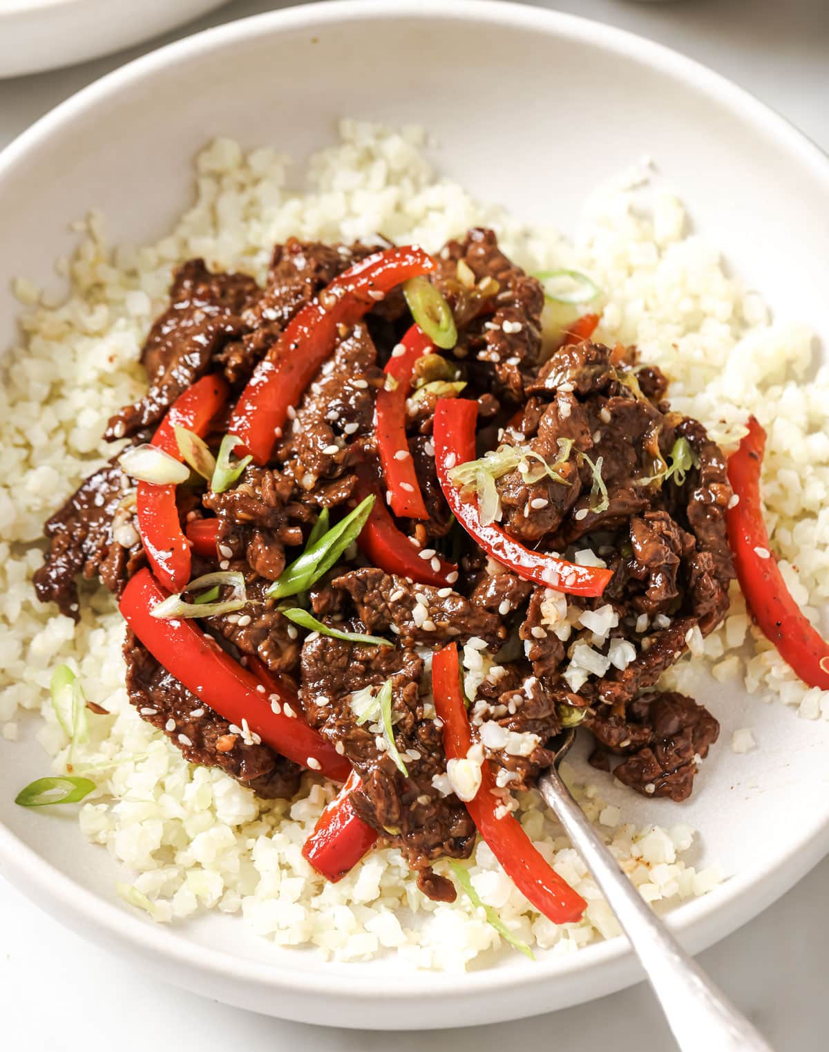 Mongolian Beef served over cauliflower rice.