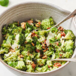 keto broccoli salad with chopped broccoli, bacon, parmesan and nuts and seeds in a bowl.
