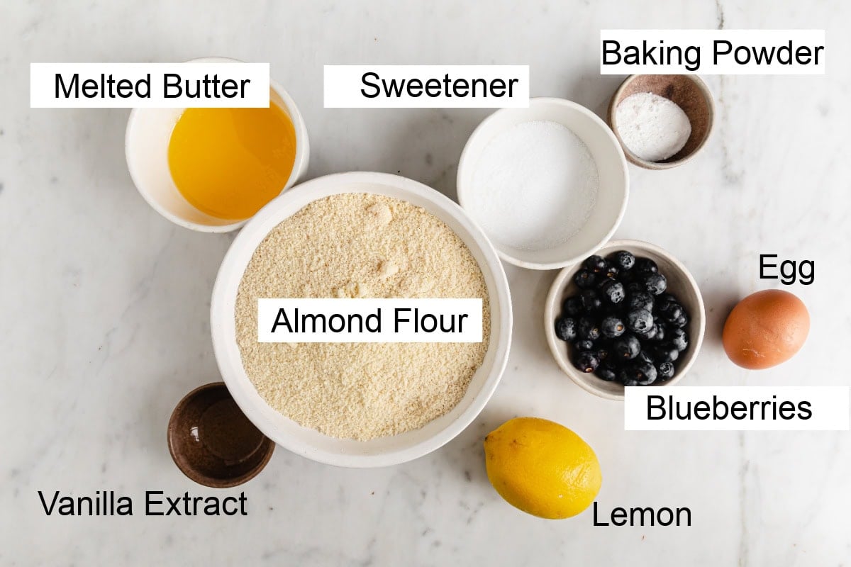 Ingredients to make keti blueberry scones, measured into bowls and labelled.