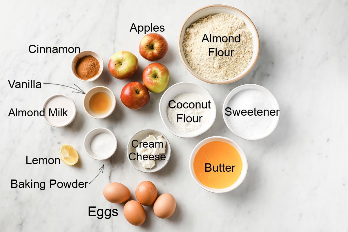 Ingredients to make keto apple cake, measured into bowls and labelled.