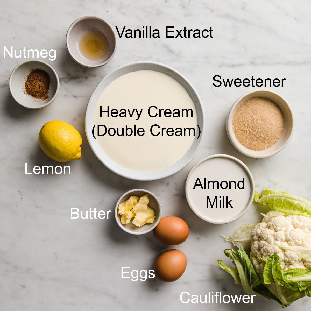 Ingerdients to make cauliflower rice pudding, measured into bowls and labelled.