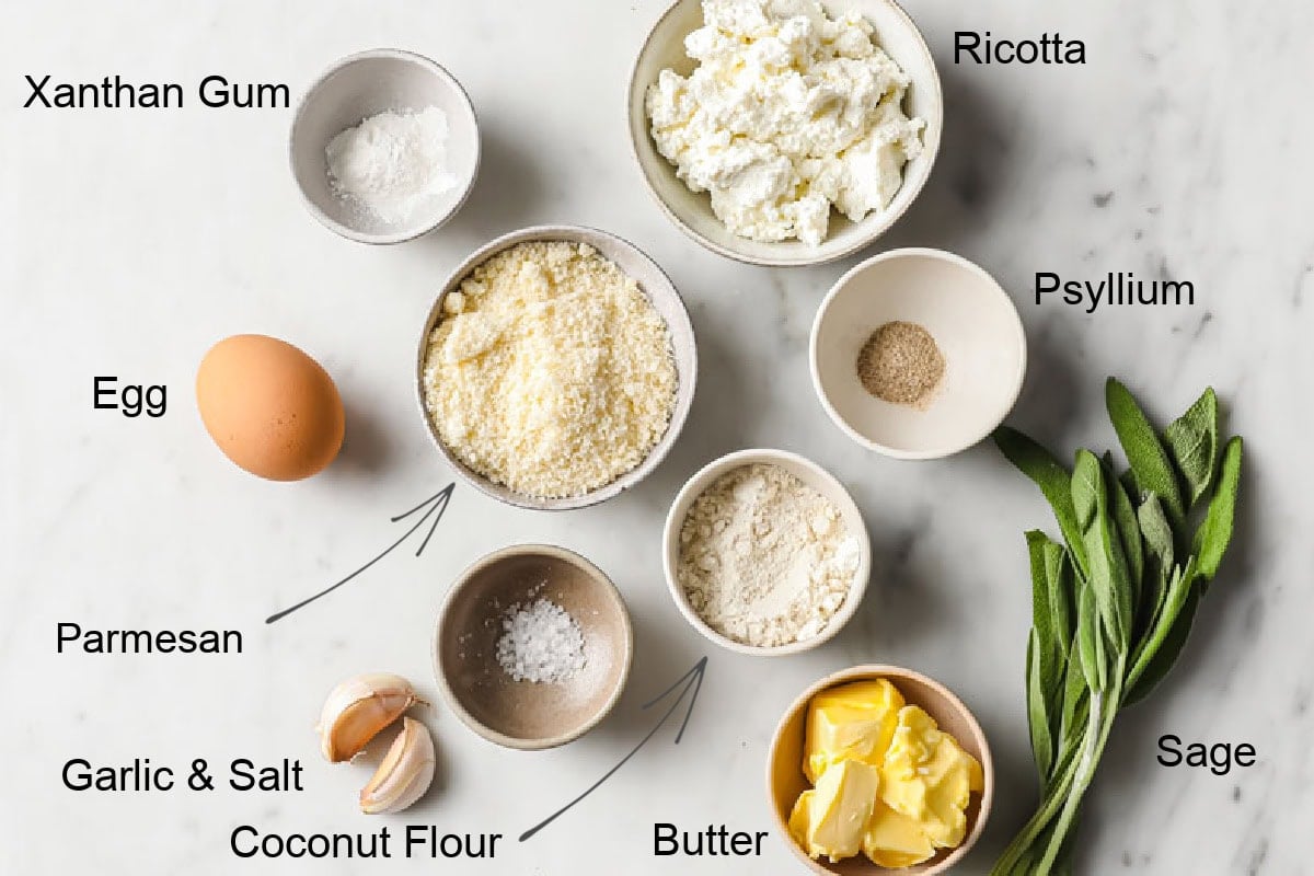 Ingredients to make keto ricotta gnocchi, measured into bowls and labelled.