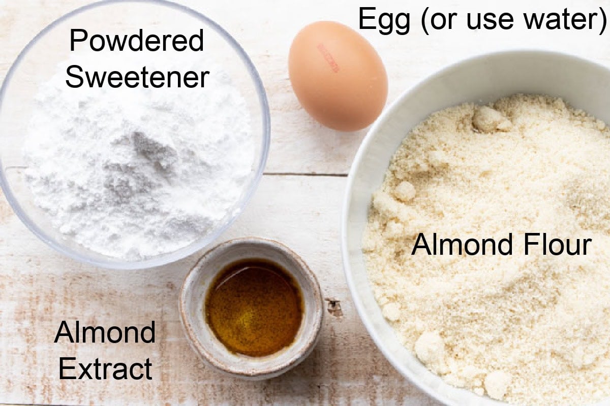 Ingredients to make keto marzipan, measured into bowls and labelled.