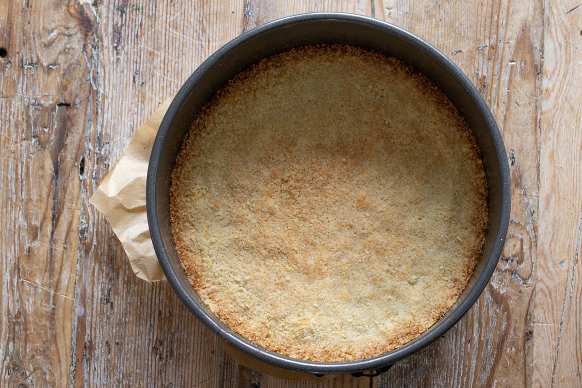 The baked crust in a springform.