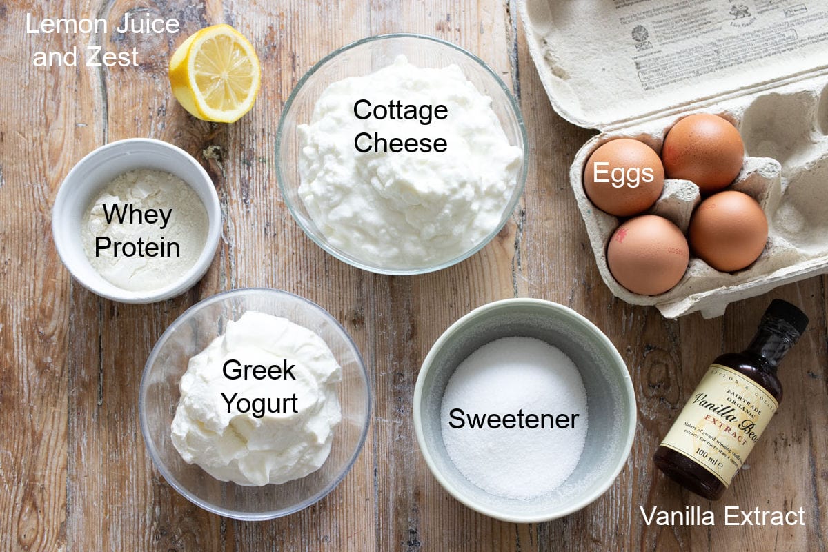 Ingredients to make a cottage cheese cheesecake filling, measured into bowls and labelled.