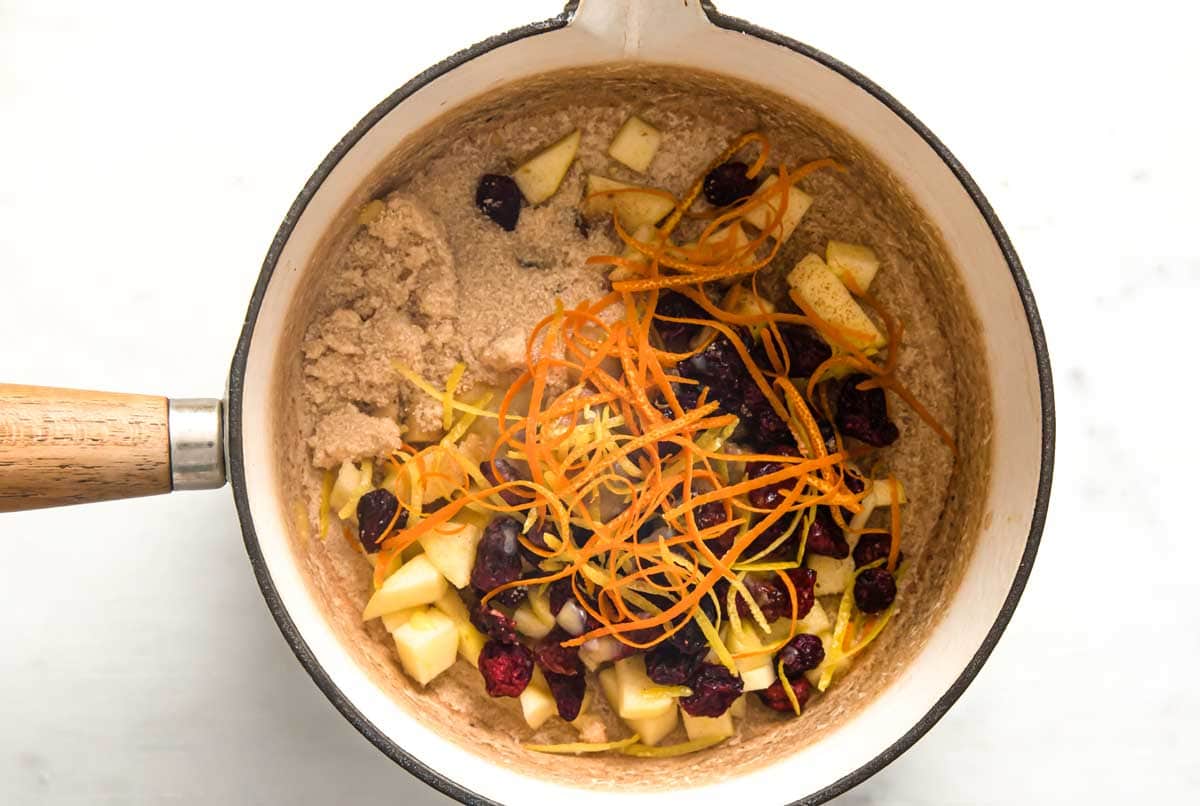 Fruit, sweetener, spices and zest in a saucepan.