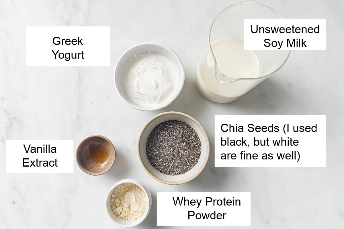 Ingredients to make protein chia pudding, measured into bowls and labelled.