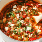 A heavy-bottomed pot with keto friendly Spanish chicken stew.
