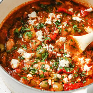 A heavy-bottomed pot with keto friendly Spanish chicken stew.