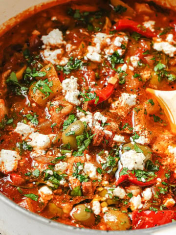 A heavy-bottomed pot with keto friendly Spanish chicken stew.