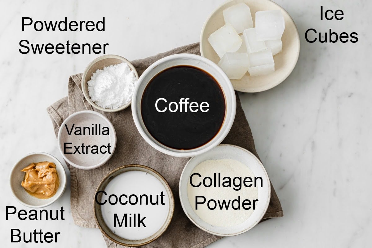 Ingredients to make a keto coffee smoothie, measured into bowls and labelled