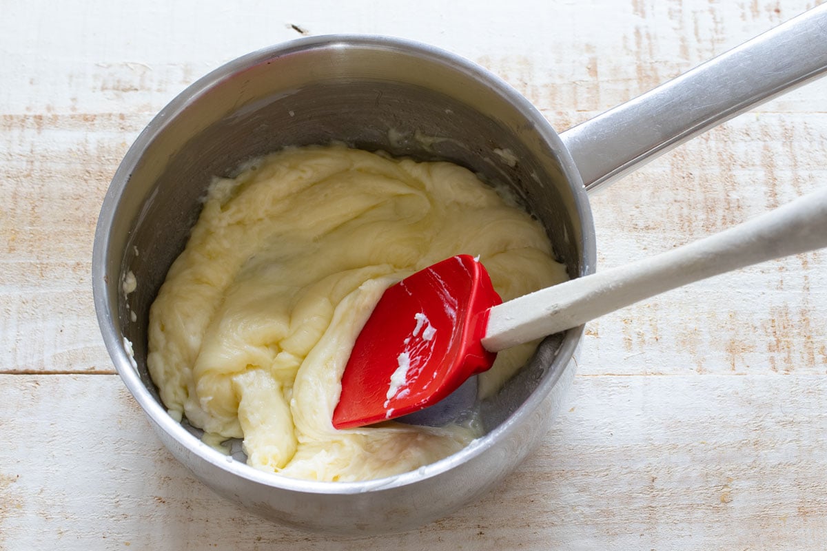 Melted mozzarella and cream cheese in a pot.