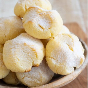 Cottage cheese cookies stacked in a bowl.
