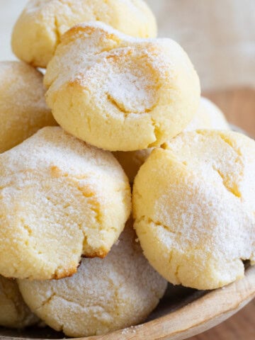 Cottage cheese cookies stacked in a bowl.